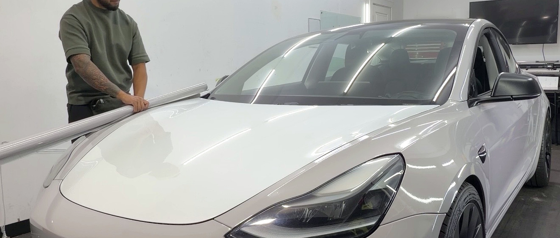 Roshie Automotive vinyl wrap installation on a Tesla Model 3